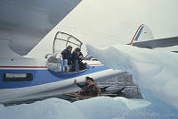 Greenland, Qaqortog, Catalina PBY-5A hydroplane and local boys in dug out canoe. Peter Stuyvesant Travel Odyssey 1993/1994.